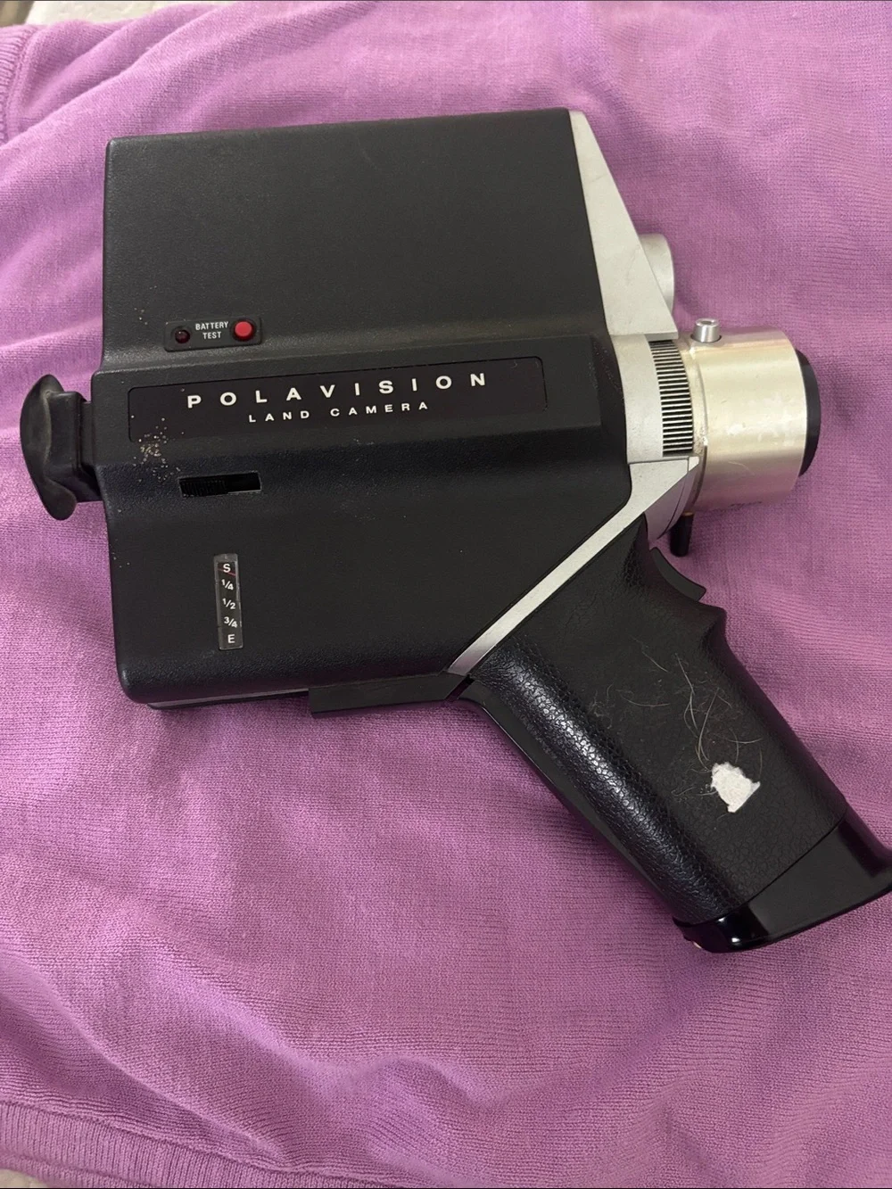 Antique Polaroid Polavision Land Camera in Black and Silver on Pink